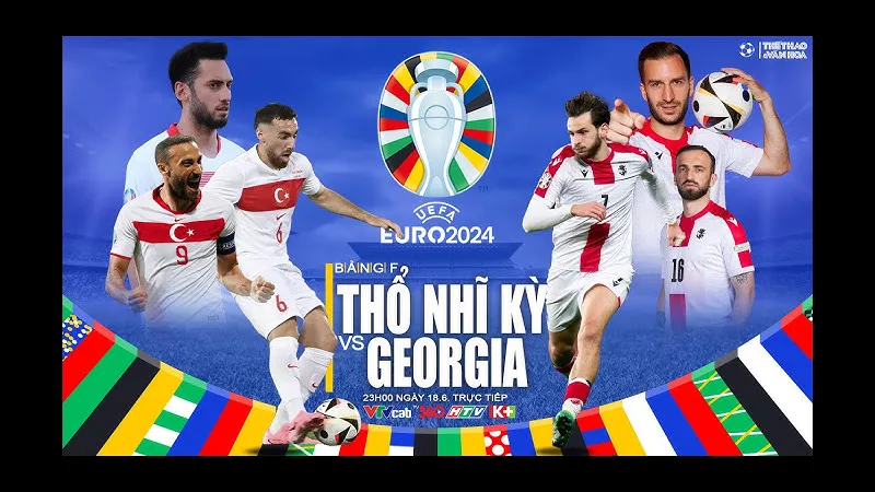 Cầu thủ Thổ Nhĩ Kỳ dẫn bóng qua hậu vệ Georgia trong trận đấu Cầu thủ Thổ Nhĩ Kỳ dẫn bóng qua hậu vệ Georgia trong trận đấu